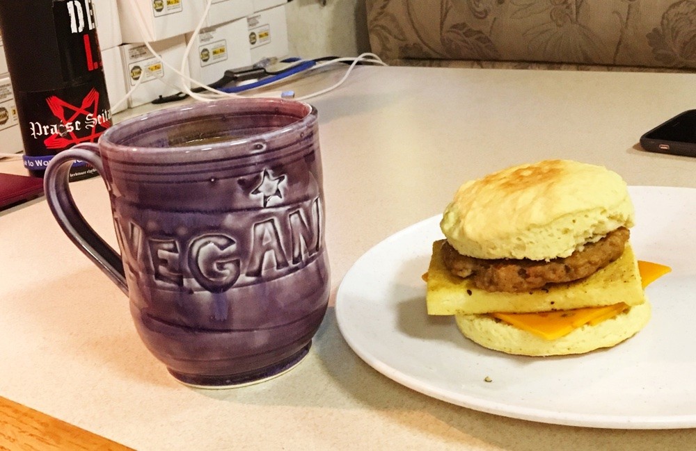vegan breakfast sandwich and coffee