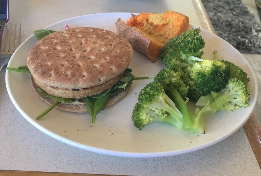 Veggie burger, half a sweet potato with nutritional yeast, broccoli.