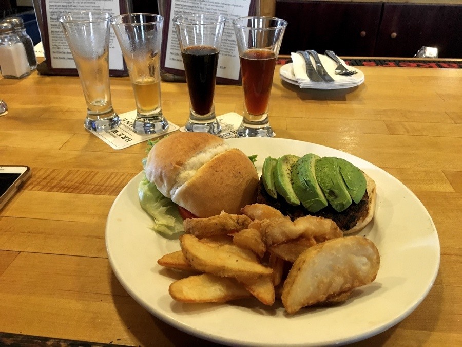 veggie chipotle burger with fries at outer banks brewing station.