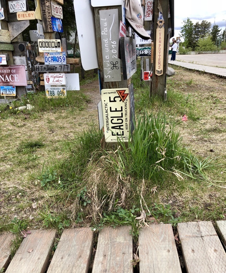 veganrv sign at sign post forest.
