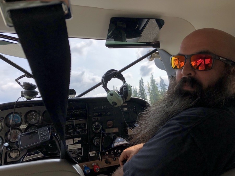 Kevin is the co-pilot on our prop plane flight to denali.
