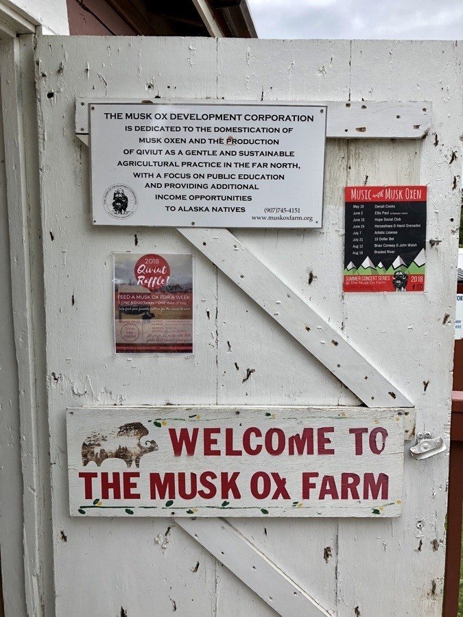 welcome to the musk ox farm sign.