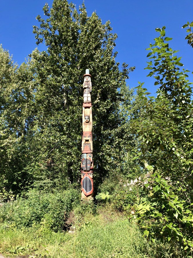 totem pole at alaska native heritage center in anchorage.