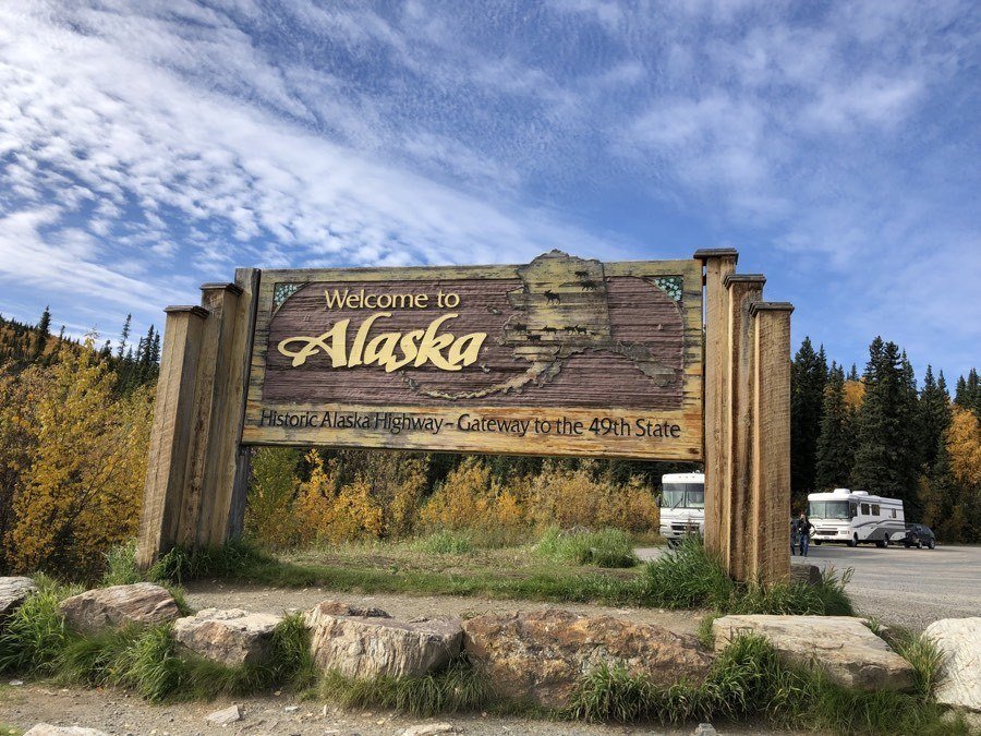 welcome to alaska sign at yukon border on the alaska highway.