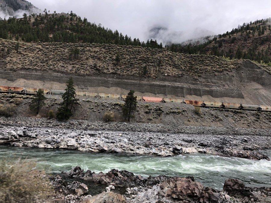 train by the thompson river in british columbia.