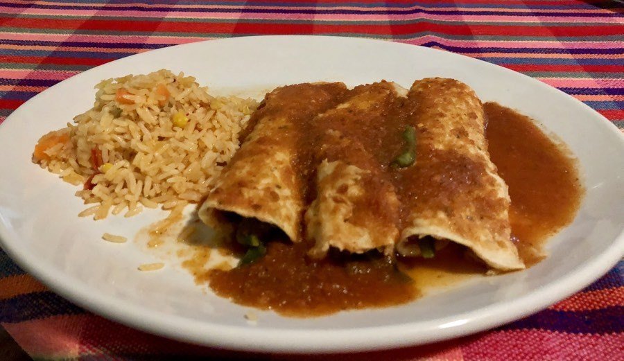 vegan enchiladas with red sauce at cafe maria in los barriles, bcs, mexico.