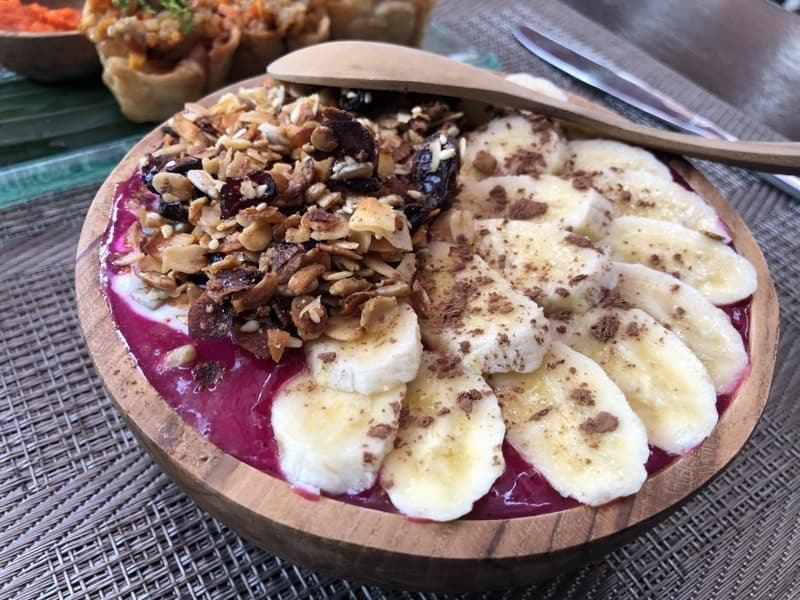 smoothie bowl close up at the onion in ubud, bali, indonesia.