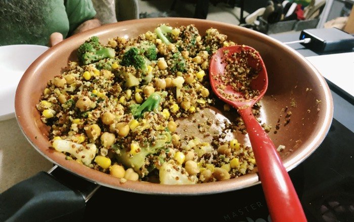 chickpea quinoa curry bowl in pan.