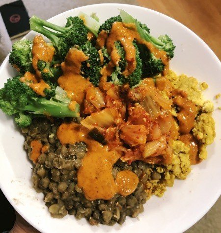 lentils and broccoli with red curry sauce.