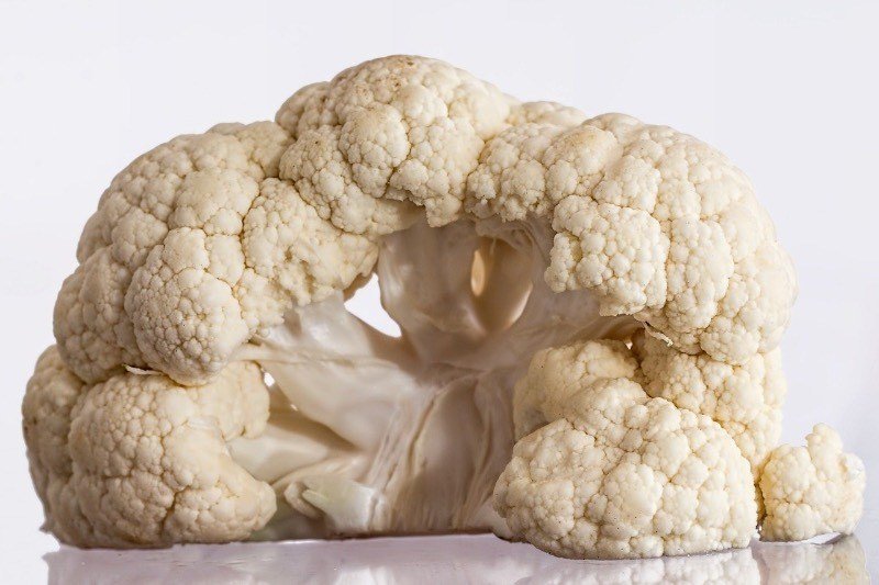 raw head of cauliflower.