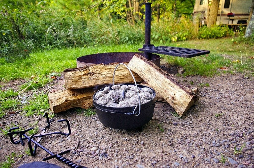dutch oven and wood for cooking while camping.