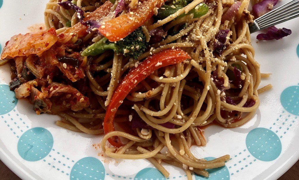 kung pao style noodles on a plate.