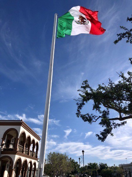 mexican flag in the historic square in san jose del cabo, baja california sur.