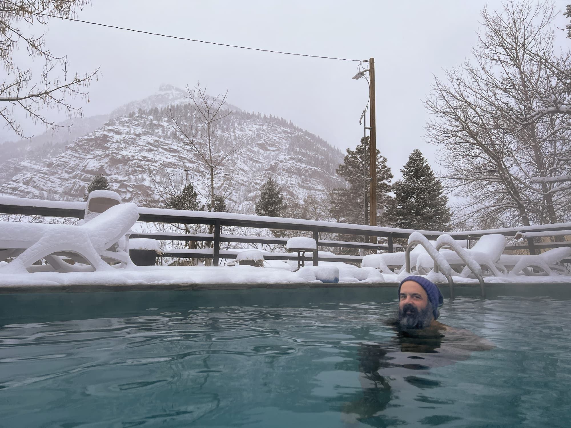 kevin in the outdoor hot springs at the weisbaden hotel in ouray, colorado.