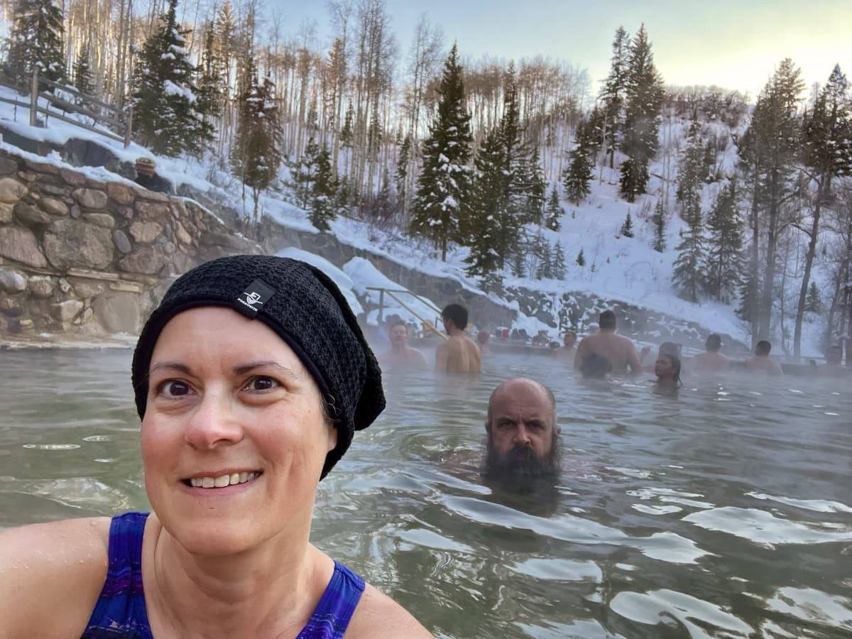 laura and kevin in the water at strawberry park hot springs, steamboat springs, colorado.