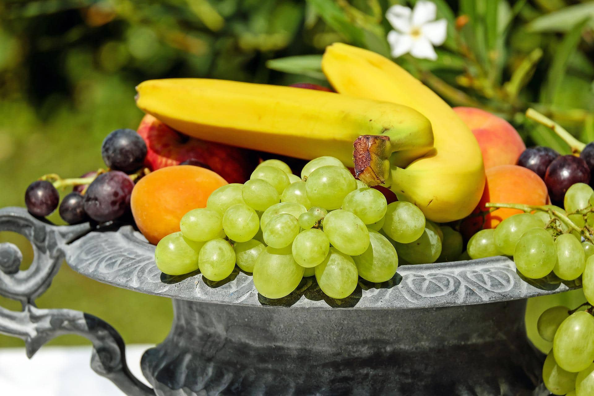 an assortment of fruits on a platter.